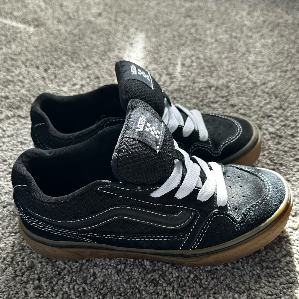 Vans Black and White Sneakers Iconic Skate Design